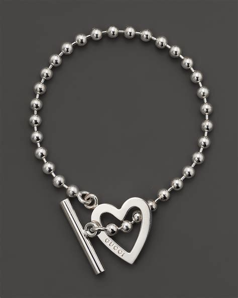 gucci silver and wood clasp bracelet|Gucci sterling silver heart bracelet.